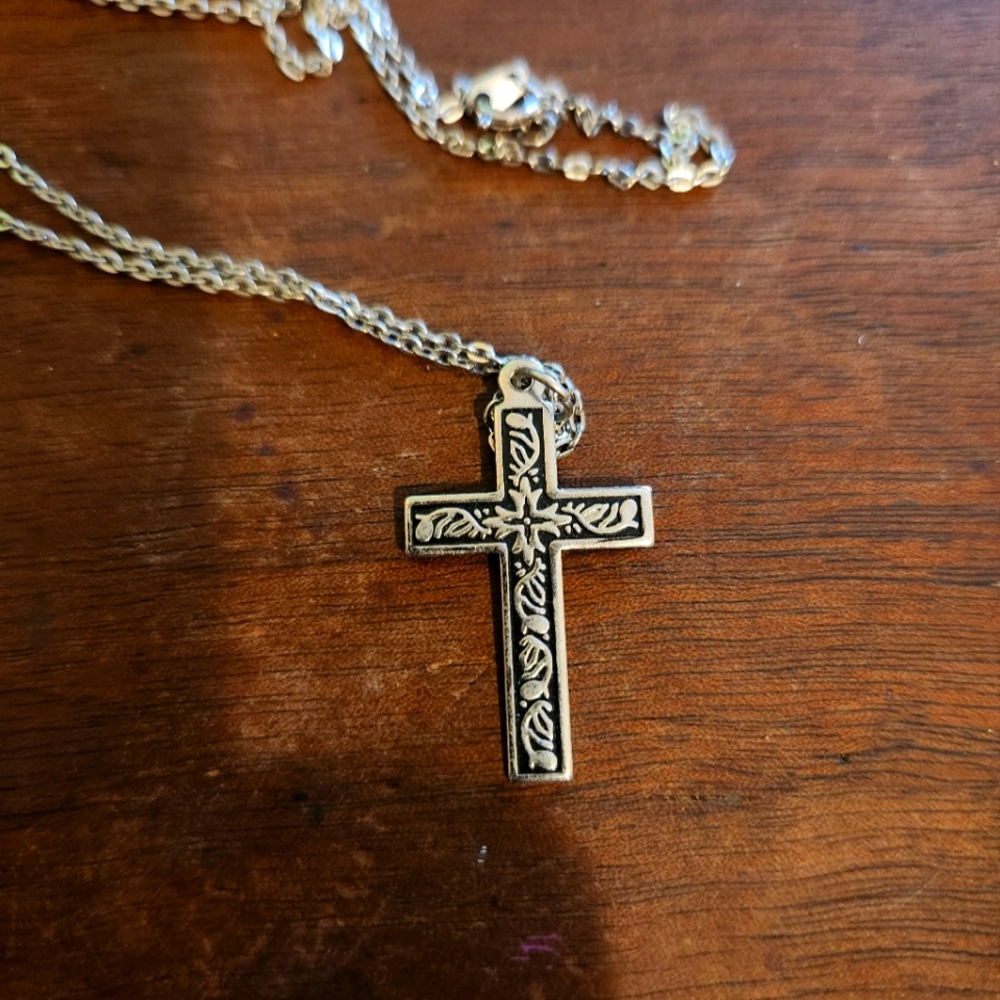 Silver tone metal cross